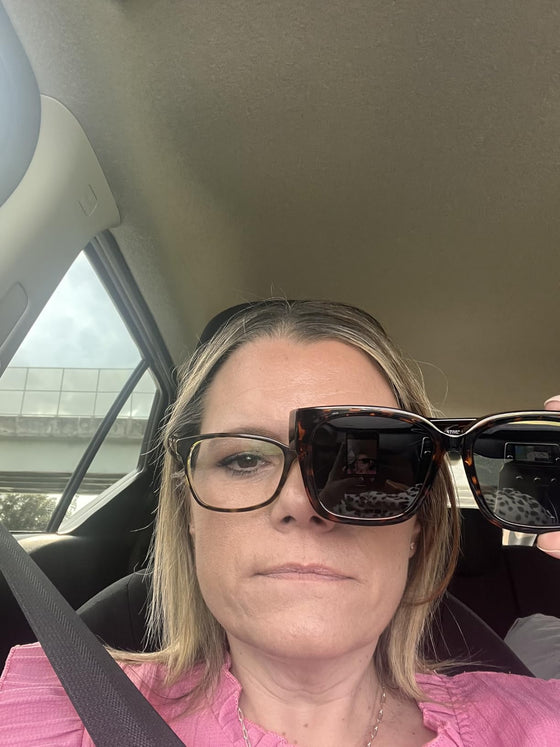 Julia E. wearing fit-over sunglasses