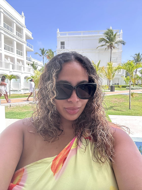 Steph D. wearing fit-over sunglasses