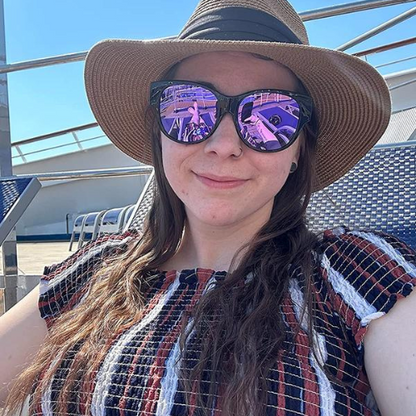 Ash T. wearing fit-over sunglasses