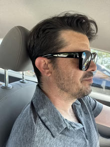 George wearing Saint shades