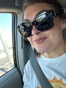 Tiara L. wearing fit-over sunglasses